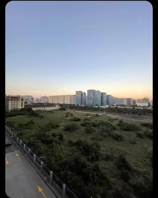 a view of a beach with buildings in the background at JL shore Staycation in Manila