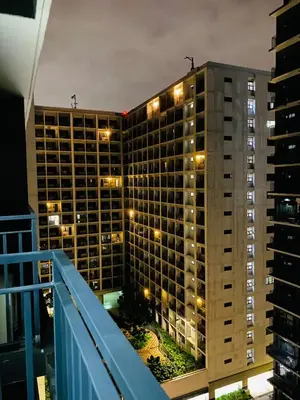 a view of a building from a balcony at SMDC Shore 3 Residences in Manila