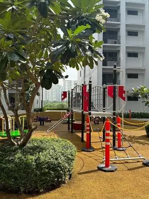 a playground with orange and white cones and a tree at Casa Nette in Manila