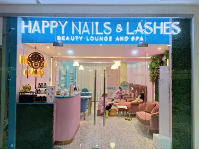 a store with a sign that reads happy nails and lashes at Velvet Room near MOA with a Cozy, Comfy Bed in Manila