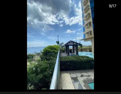 a view of the ocean from a balcony of a hotel at FamilyRoom 1 bedroom in Manila