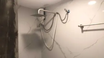 a hair dryer on a wall in a bathroom at OYO 1128 HOTEL SANGCO in Manila
