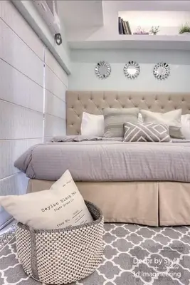 a bedroom with a large bed with a large headboard at Viceroy residence McKinley BGC taguig in Manila