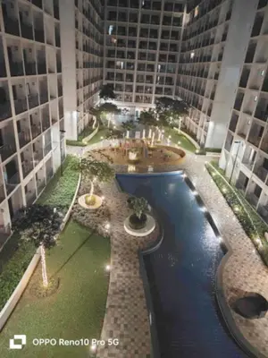 an overhead view of a building with a pool at G Spot Manila - Mall of Asia in Manila