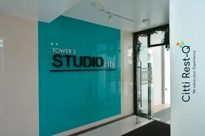 a window of a store with a sign on the wall at Studio City Alabang Pool Access Free for 2 Wifi & Netflix SC2 in Manila