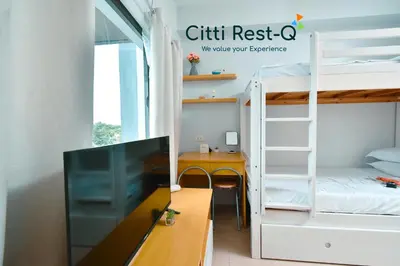 a room with a desk and a bunk bed at Studio City Alabang Pool Access Free for 2 Wifi & Netflix SC2 in Manila