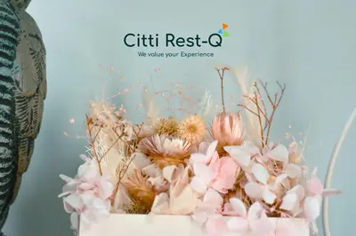 a bouquet of pink flowers in a vase at Studio City Alabang Pool Access Free for 2 Wifi & Netflix SC3 in Manila