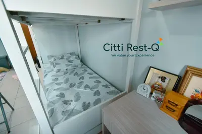 a small bedroom with a bed in a room at Studio City Alabang Pool Access Free for 2 Wifi & Netflix SC3 in Manila