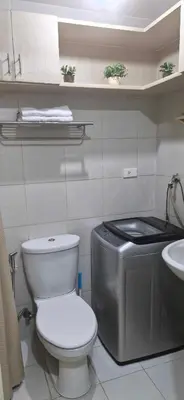 a bathroom with a toilet and a sink at SM JAZZ RESIDENCES-Urban Escape in Manila