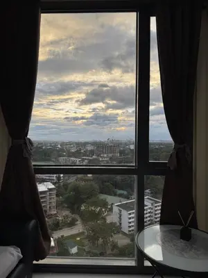 a view of a city from a window at 1BR Condo Near Venice Canal & BGC with Great View - 20k in Manila