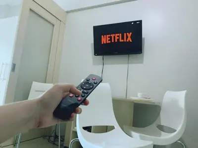 a person holding a video game remote control at Sea Residences by Sir Jan 0995-448-8872 in Manila