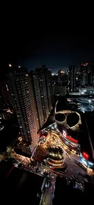 a city at night with a lot of traffic at Birch Tower Condominium Malate Manila by T&T in Manila