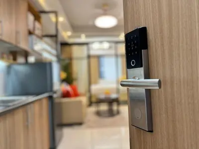 an open door with a handle in a kitchen at 1230 Flor Suite Shore 3 Residences near SM MOA by PrimeStay in Manila