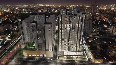 a view of a large building in a city at night at Rolly's Place in Manila