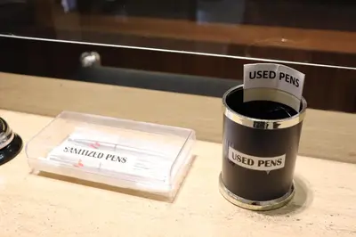 a used pen sitting on a table next to ascribed pasool at Jinjiang Inn - Ortigas in Manila