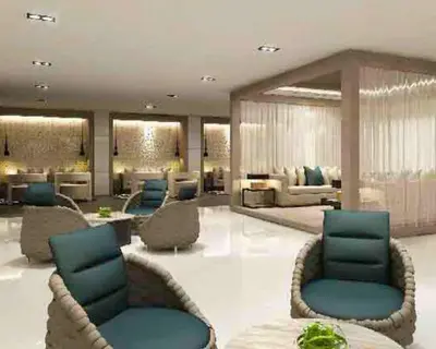 a large lobby with blue chairs and couches at Las Vegas of the Philippines in Pasay Manila Luxury Near NAIA Airport x Solaire x Okada x City of Dreams and Casinos Enjoy FREE Pool Access n HighSpeed WIFI and Netflix Comfort with ResortType Living Secure Your Limited Offer This Month in Manila
