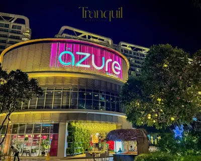 a building with a sign that says olympus on it at Azure Staycation in Manila