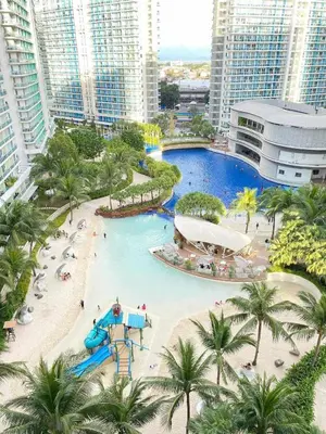 an aerial view of a water park in a city at Maldives Suites, Azure Urban Resorts and Residences in Manila