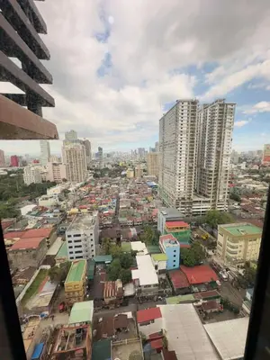 a view of a city with tall buildings at 1 BEDROOM Staycation in Pasay in Manila