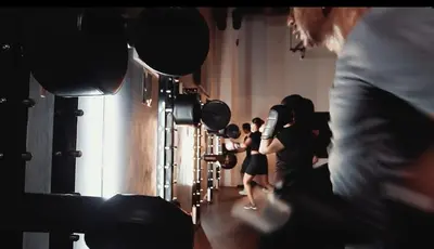 a group of people standing in a room with cameras at Cosmo Nest Air Skyline One BR Makati 2270 Gym Swim Park 300 Mbps in Manila