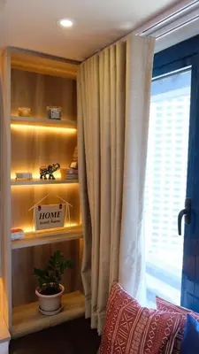 a room with a book shelf and a window at Air residence Fantasy Sophisticated Heaven on earth Gym Swim Park 300 MB in Manila