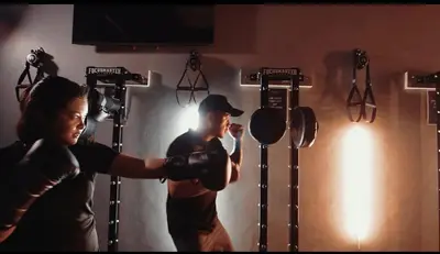 a man and a woman boxing in a gym at Makati Broadway Bliss Golden spot Gym Swim Park 300 Mbps 1940 in Manila