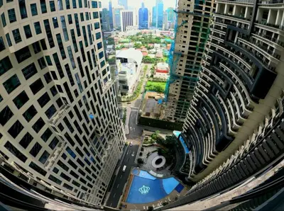 an aerial view of a city with tall buildings at ElixirStaycation at Knightsbridge Residences in Manila