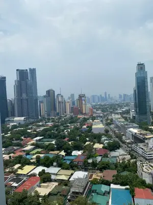 a city with many buildings and a city skyline at jazz residence in Manila