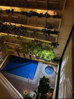 an overhead view of a swimming pool in a building at Happy stay Condotel near NAIA terminal 3 in Manila