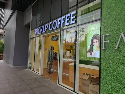 a store front with a sign for a coffee shop at 1BR Condotel with Balcony at FAME Residences #FM64 in Manila