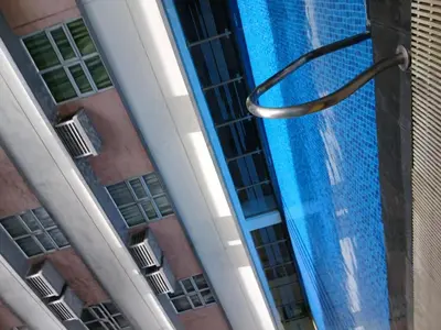 an overhead view of a swimming pool in a building at 101 Newport in Manila