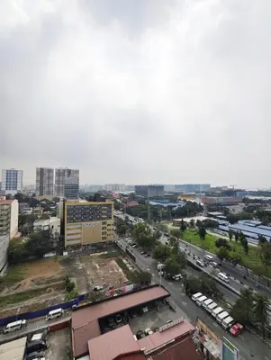 an aerial view of a city with a street at Atmosphere You Secret Hideaway in Manila
