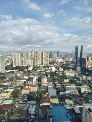 an overhead view of a city with tall buildings at Escape To Paradise in Manila