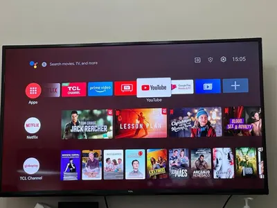 a television screen with a bunch of movies on it at Staycation at Field Residences Near Airport in Manila