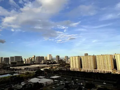 a view of a city with tall buildings at Lotus' Suite in Manila