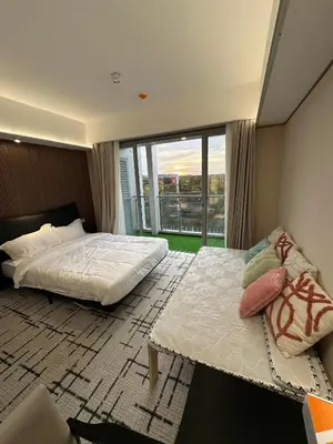 Gallery image of Spacious Elegant Apartment Hotel near City of Dreams, Airport, MOA, Okada, Ayala Malls, and Solaire Casino with free 5 pool access in Manila
