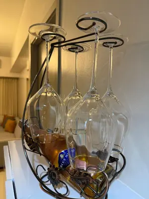 three wine glasses sitting on top of a table at Glamorous SMDC Shore 3, 5 Star Rate BnB-Wifi-Netflix in Manila