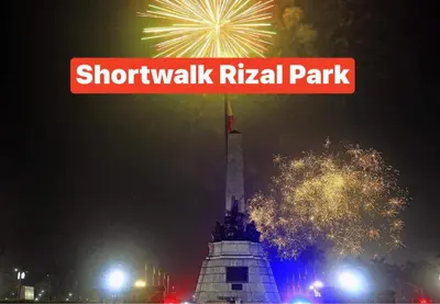 a sign that reads shaughkiss ritz missile park at night at Birch Tower a4 front of Robinson Mla FREEpool in Manila