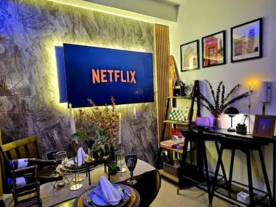 a restaurant with a netflix sign on the wall at Irene's Luscious Place in Manila