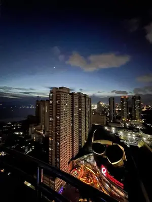a view of a city at night with buildings at Kiean Leases in Manila