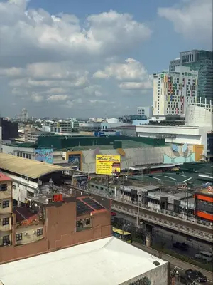 a view of a city with buildings and buildings at Condo in Cubao by Cindy in Manila