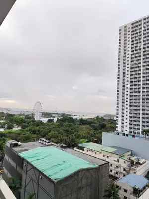 an overhead view of a building with a green roof at Experience Unforgettable Moments in Manila
