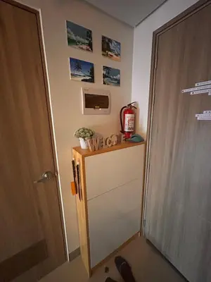 a room with a door and a shelf on the wall at S Residences, Tower-3 in Manila