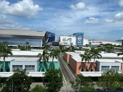 a view of a city with buildings and palm trees at Sea Crib in Manila