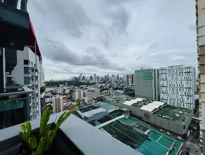 a view of a city from a building at Casa Tagpuan at Manhattan Heights in Manila