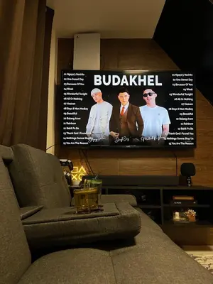a flat screen tv sitting in a living room at Binangonan Jarmelas Tiny Home with Free Breakfast in Binangonan