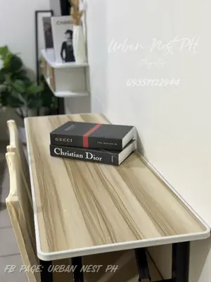 two books sitting on top of a table at Jam Reid Condotel Mandaluyong in Manila