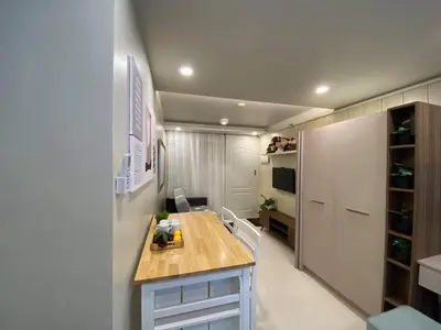 a room with a table with a toy car on it at Cozy Studio Sorrento Oasis Rosario Pasig in Manila