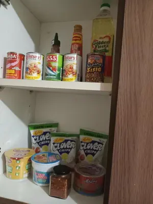 a pantry filled with lots of different types of food at Radiance manila bay in Manila