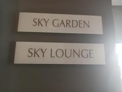 two signs that say sky garden and sky lounge at Radiance manila bay in Manila